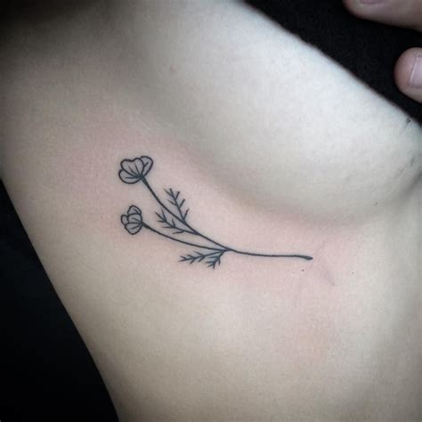 cute small side breast tattoo